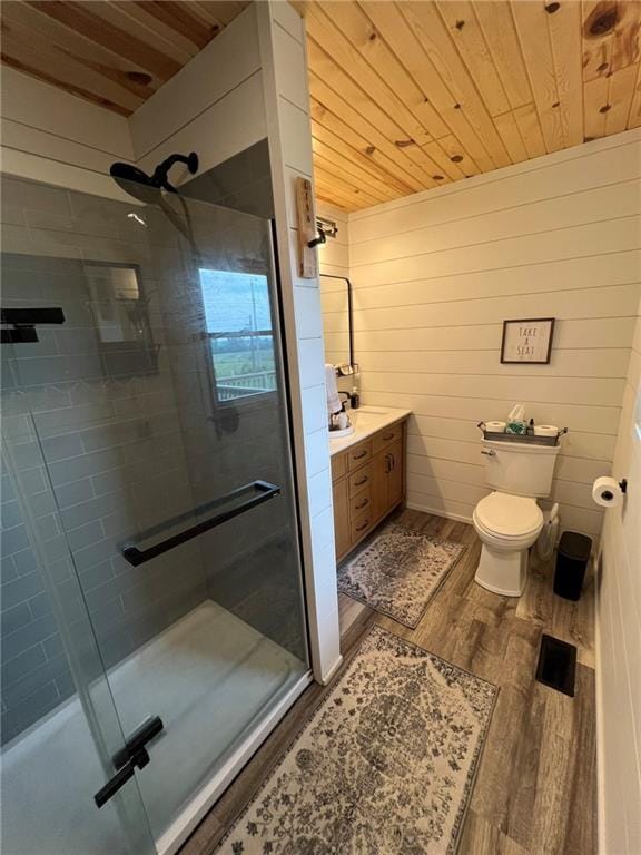605 Queen St, King City, MO 64463 - full bathroom with wood finished floors, a shower stall, wood ceiling, toilet, and vanity