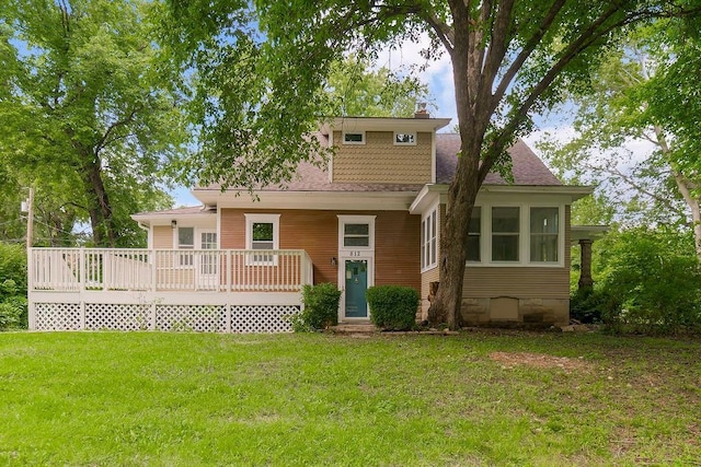 812 E Wabash St, Olathe, KS 66061 - rear view of house featuring a yard, a deck, and entry steps