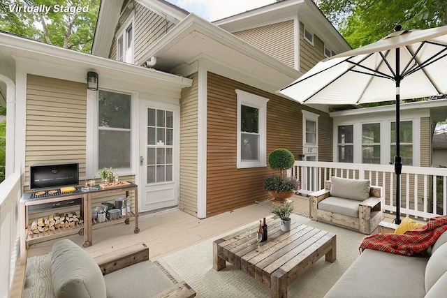 812 E Wabash St, Olathe, KS 66061 - view of patio featuring an outdoor hangout area and a deck