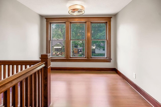 812 E Wabash St, Olathe, KS 66061 - unfurnished room featuring wood finished floors and baseboards