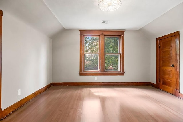 812 E Wabash St, Olathe, KS 66061 - additional living space featuring wood finished floors and lofted ceiling