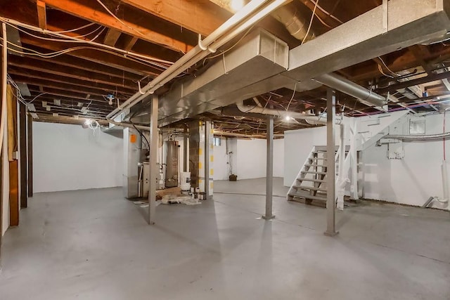 812 E Wabash St, Olathe, KS 66061 - unfinished basement featuring stairway and water heater