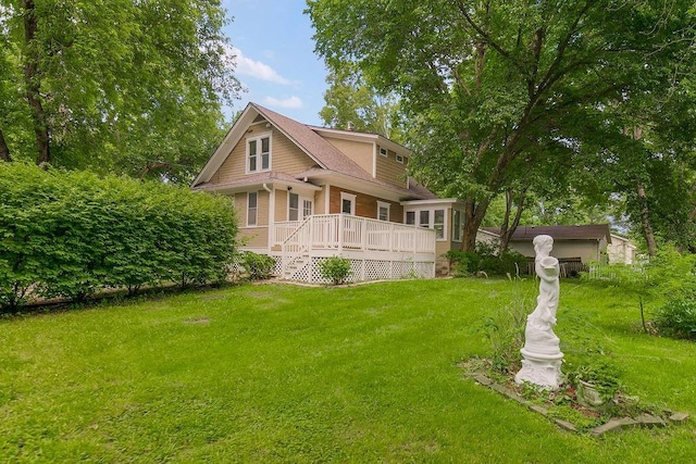 812 E Wabash St, Olathe, KS 66061 - view of front of house featuring a deck and a front lawn