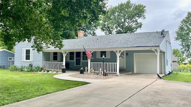 1146 S Willow St, Ottawa, KS 66067 - single story home featuring covered porch, a garage, a front lawn, driveway, and a chimney