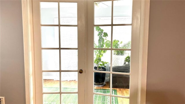 1146 S Willow St, Ottawa, KS 66067 - doorway to outside featuring french doors and healthy amount of natural light