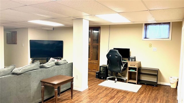 1146 S Willow St, Ottawa, KS 66067 - office area featuring a drop ceiling, wood finished floors, and baseboards