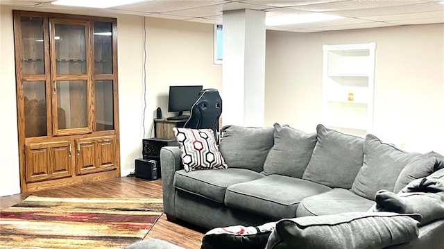 1146 S Willow St, Ottawa, KS 66067 - living area with wood finished floors and a paneled ceiling