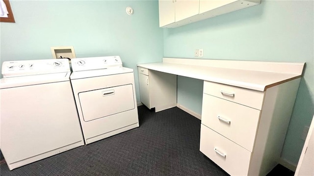 1146 S Willow St, Ottawa, KS 66067 - laundry area featuring separate washer and dryer, dark colored carpet, and cabinet space