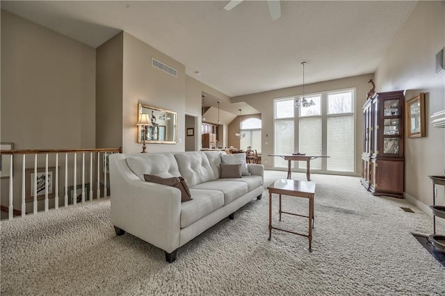 12207 England St, Overland Park, KS 66213 - living area featuring carpet, ceiling fan, and baseboards