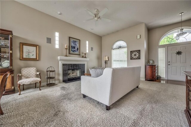 12207 England St, Overland Park, KS 66213 - living area featuring ceiling fan, carpet floors, and plenty of natural light