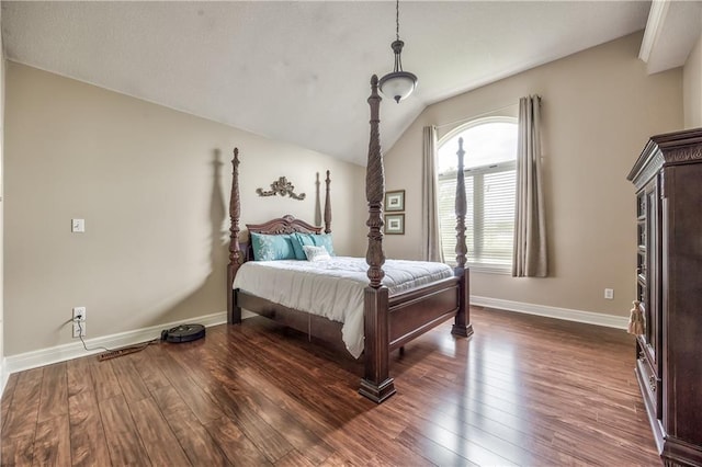12207 England St, Overland Park, KS 66213 - bedroom featuring vaulted ceiling, dark wood finished floors, and baseboards