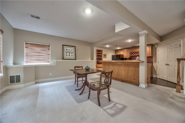 12207 England St, Overland Park, KS 66213 - dining area featuring light colored carpet, baseboards, bar, recessed lighting, and plenty of natural light