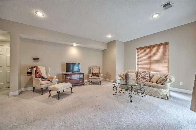 12207 England St, Overland Park, KS 66213 - living room featuring light carpet, baseboards, and recessed lighting