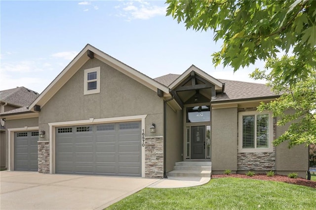 16570 S Ingrid St, Gardner, KS 66030 - view of front of house with a garage, stone siding, stucco siding, concrete driveway, and a front lawn