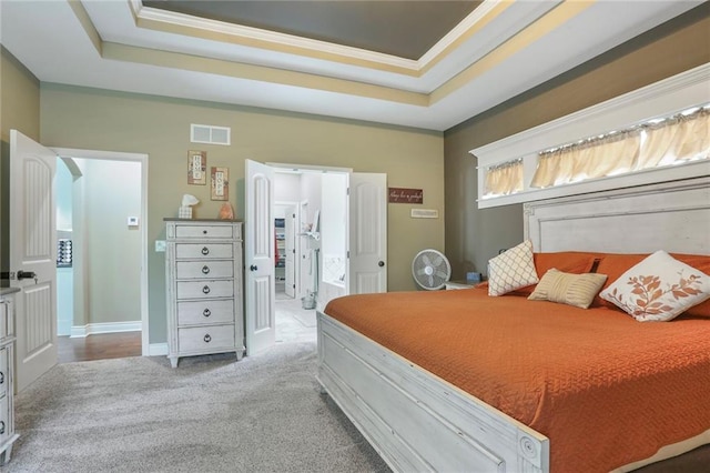 16570 S Ingrid St, Gardner, KS 66030 - bedroom with carpet flooring, a tray ceiling, and ornamental molding