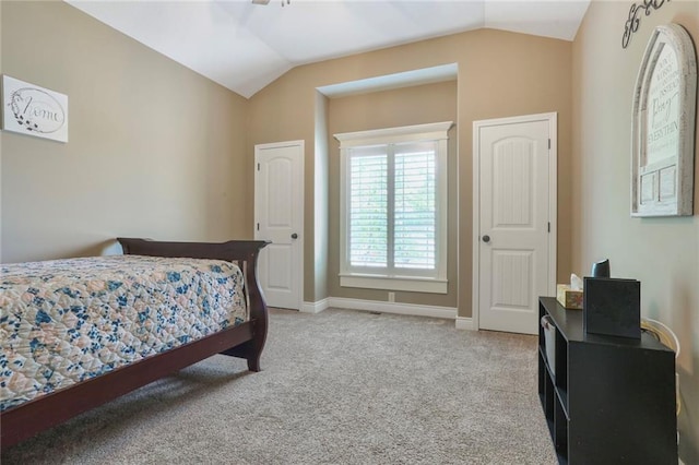 16570 S Ingrid St, Gardner, KS 66030 - bedroom with lofted ceiling, light colored carpet, and baseboards