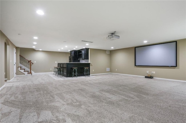 16570 S Ingrid St, Gardner, KS 66030 - home theater room with recessed lighting, a bar, carpet, and baseboards