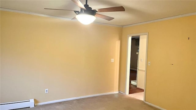 1441 S Maple St, Ottawa, KS 66067 - empty room with a baseboard radiator, ceiling fan, ornamental molding, and light carpet