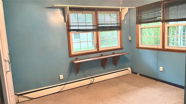 1441 S Maple St, Ottawa, KS 66067 - empty room featuring a baseboard radiator and carpet floors