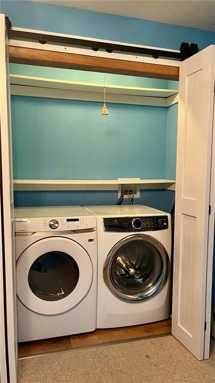 1441 S Maple St, Ottawa, KS 66067 - washroom with washing machine and clothes dryer
