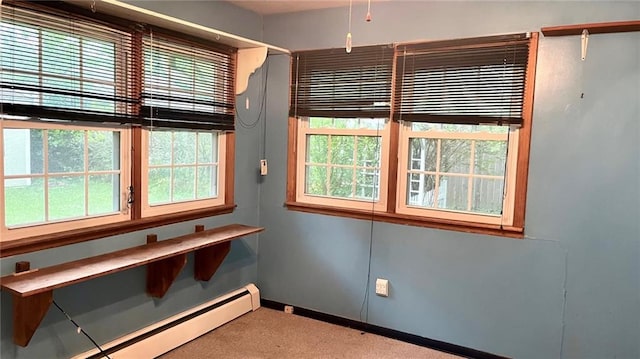 1441 S Maple St, Ottawa, KS 66067 - interior space with a baseboard radiator and carpet floors