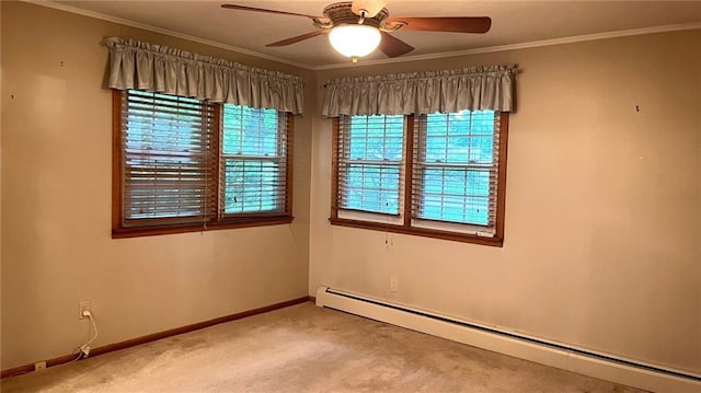 1441 S Maple St, Ottawa, KS 66067 - unfurnished room with baseboard heating, light colored carpet, crown molding, and a ceiling fan