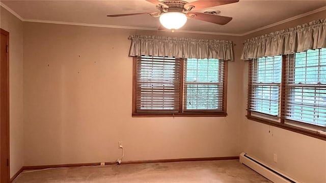1441 S Maple St, Ottawa, KS 66067 - spare room featuring a baseboard radiator, light colored carpet, ceiling fan, and crown molding