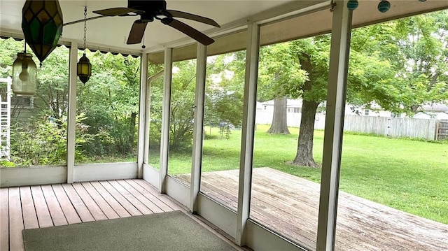 1441 S Maple St, Ottawa, KS 66067 - unfurnished sunroom featuring ceiling fan and healthy amount of natural light