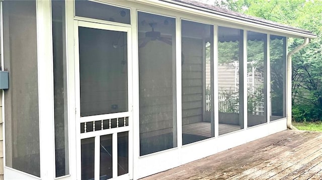 1441 S Maple St, Ottawa, KS 66067 - wooden deck featuring a sunroom