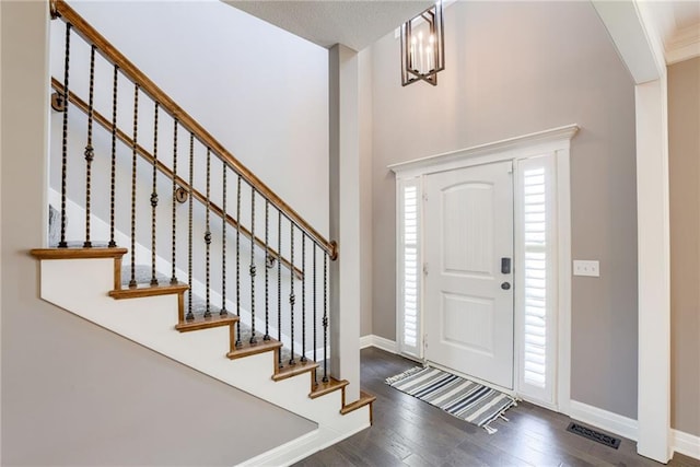 8721 N Mersington Ave, Kansas City, MO 64156 - foyer with wood finished floors and stairs