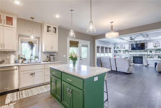 8721 N Mersington Ave, Kansas City, MO 64156 - kitchen with green cabinets, stainless steel dishwasher, ceiling fan, white cabinets, and recessed lighting