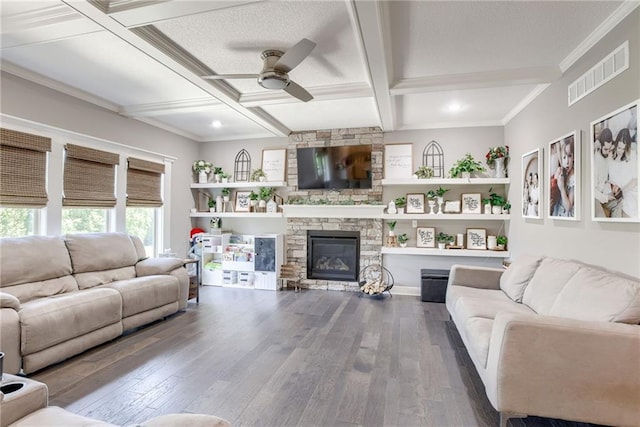 8721 N Mersington Ave, Kansas City, MO 64156 - living room featuring a ceiling fan, wood finished floors, a fireplace, beamed ceiling, and coffered ceiling