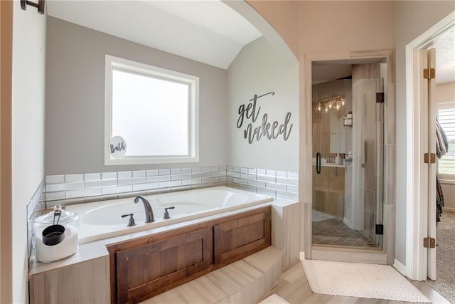 8721 N Mersington Ave, Kansas City, MO 64156 - full bathroom with a shower stall and a bath
