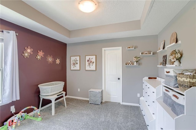 8721 N Mersington Ave, Kansas City, MO 64156 - bedroom with light carpet, a raised ceiling, and a textured ceiling