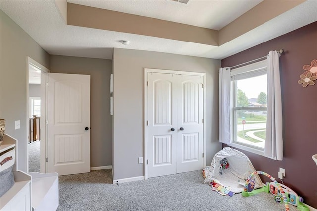 8721 N Mersington Ave, Kansas City, MO 64156 - rec room with carpet and baseboards