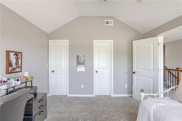8721 N Mersington Ave, Kansas City, MO 64156 - carpeted bedroom featuring vaulted ceiling and baseboards