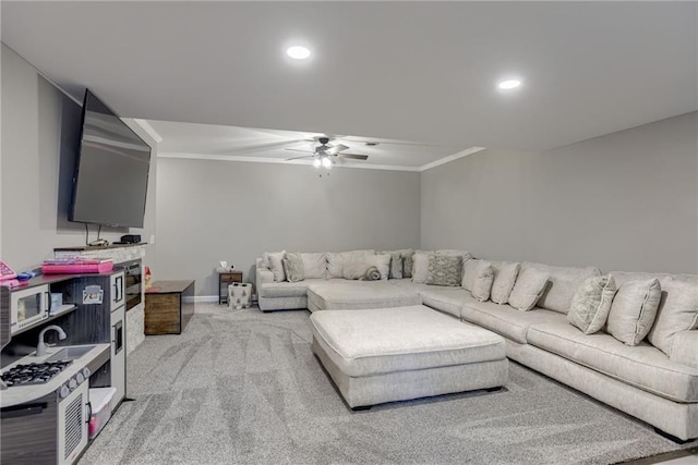 8721 N Mersington Ave, Kansas City, MO 64156 - living room featuring ceiling fan, ornamental molding, light colored carpet, and recessed lighting
