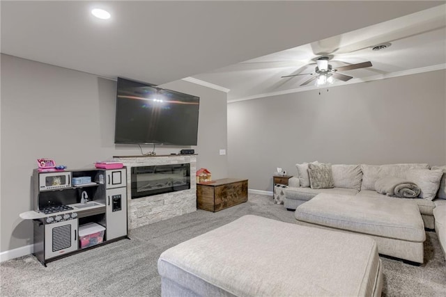 8721 N Mersington Ave, Kansas City, MO 64156 - living room with carpet, ceiling fan, crown molding, and a glass covered fireplace