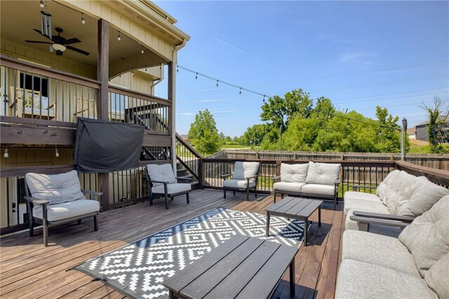 8721 N Mersington Ave, Kansas City, MO 64156 - wooden terrace featuring an outdoor hangout area, stairway, a fenced backyard, and ceiling fan