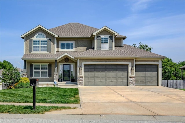 8721 N Mersington Ave, Kansas City, MO 64156 - view of front of property featuring concrete driveway, an attached garage, stone siding, and a shingled roof