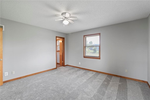 12 SW 365th Rd, Warrensburg, MO 64093 - carpeted spare room featuring ceiling fan and a textured ceiling