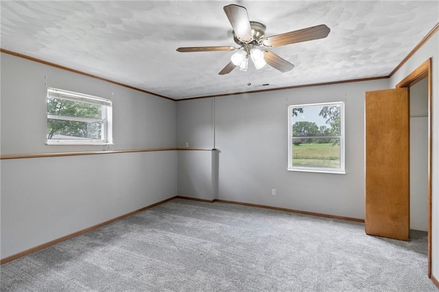 12 SW 365th Rd, Warrensburg, MO 64093 - unfurnished bedroom with crown molding, carpet, and ceiling fan