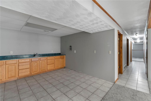 12 SW 365th Rd, Warrensburg, MO 64093 - kitchen with light tile patterned floors and dark countertops