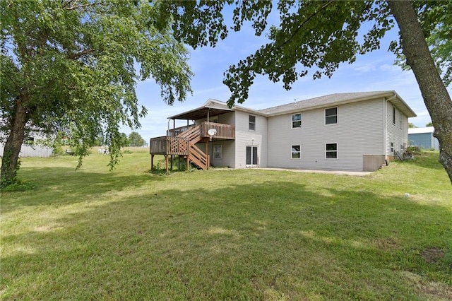 12 SW 365th Rd, Warrensburg, MO 64093 - back of house featuring stairs, a deck, and a yard
