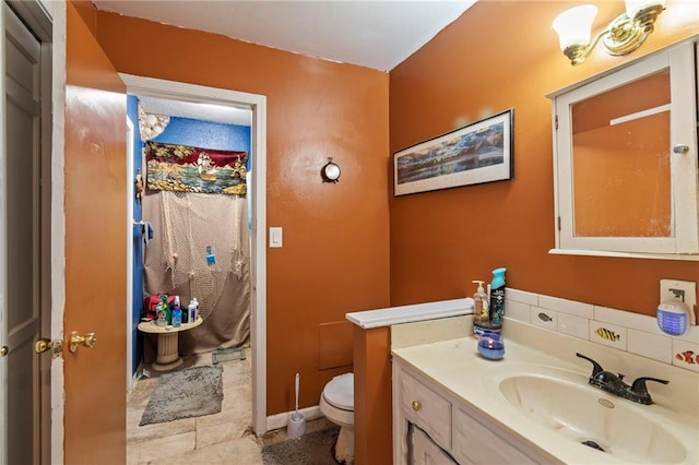 1405 S Vine St, Holden, MO 64040 - full bathroom with vanity and tile patterned flooring