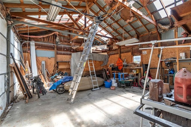 1405 S Vine St, Holden, MO 64040 - garage featuring a workshop area