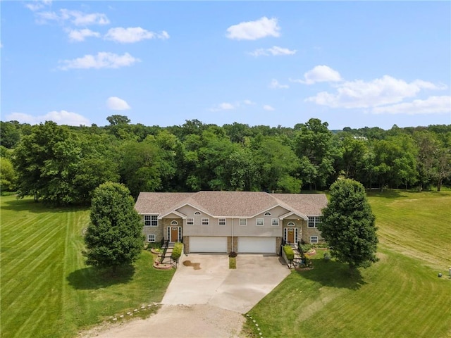 131 NW 171st Rd, Warrensburg, MO 64093 - view of front of house with concrete driveway, an attached garage, and a front yard