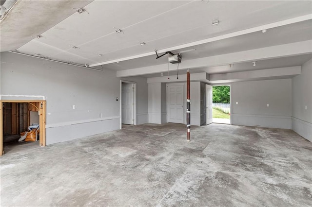 131 NW 171st Rd, Warrensburg, MO 64093 - garage featuring a garage door opener