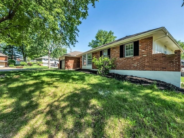 15378 E 45th St S, Independence, MO 64055 - ranch-style house featuring brick siding and a front yard