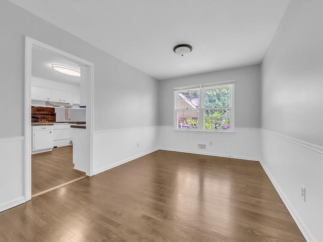 15378 E 45th St S, Independence, MO 64055 - spare room featuring wood finished floors